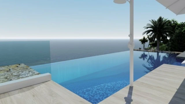 Новая вилла на берегу моря в городе Кальпе