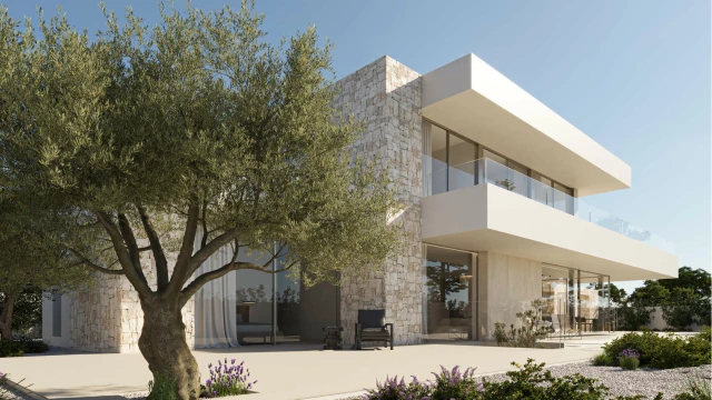 Новая современная вилла у моря в городе в Moraira