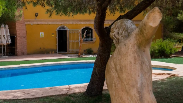 Комфортабельный дом с большим участком в городе Сьюдад Кесада