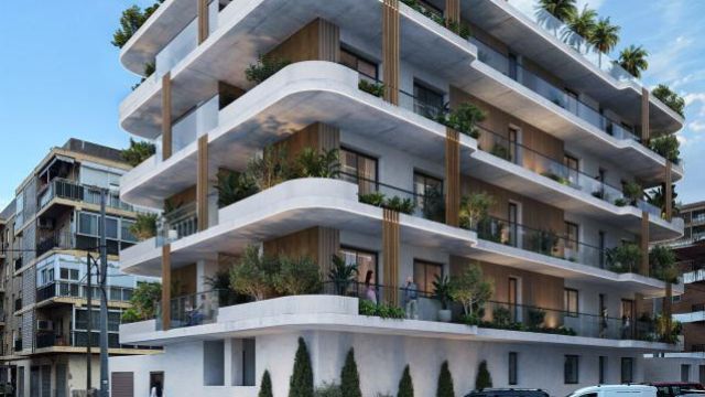 Современные апартаменты в новом доме в центре Кульеры у моря