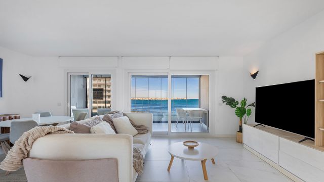 Seafront Luxury Apartment with Double Terrace in Punta Prima, Posidonia