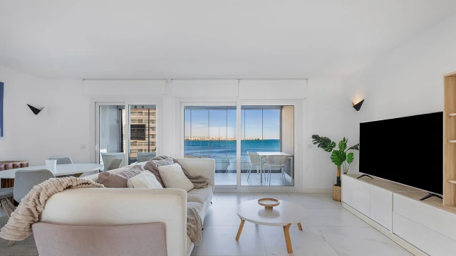 Seafront Luxury Apartment with Double Terrace in Punta Prima, Posidonia