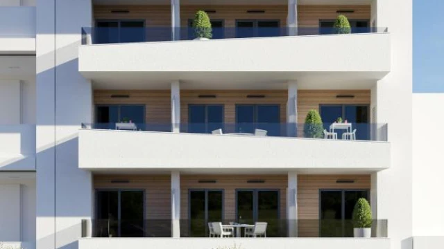 Новые апартаменты в Торревьехе с бассейном на крыше рядом с морем