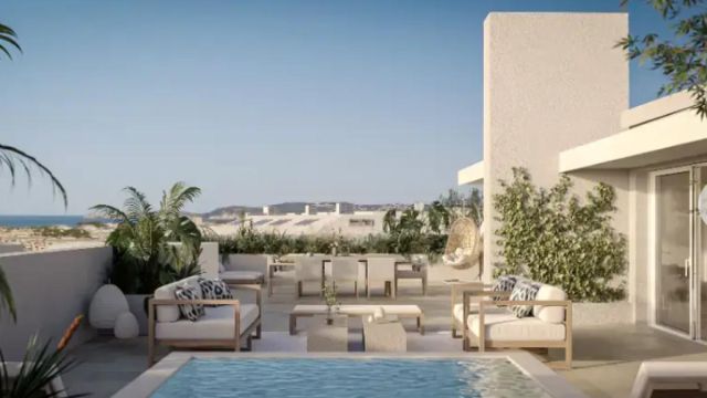 Современные апартаменты у моря с террасой, бассейном и гаражом